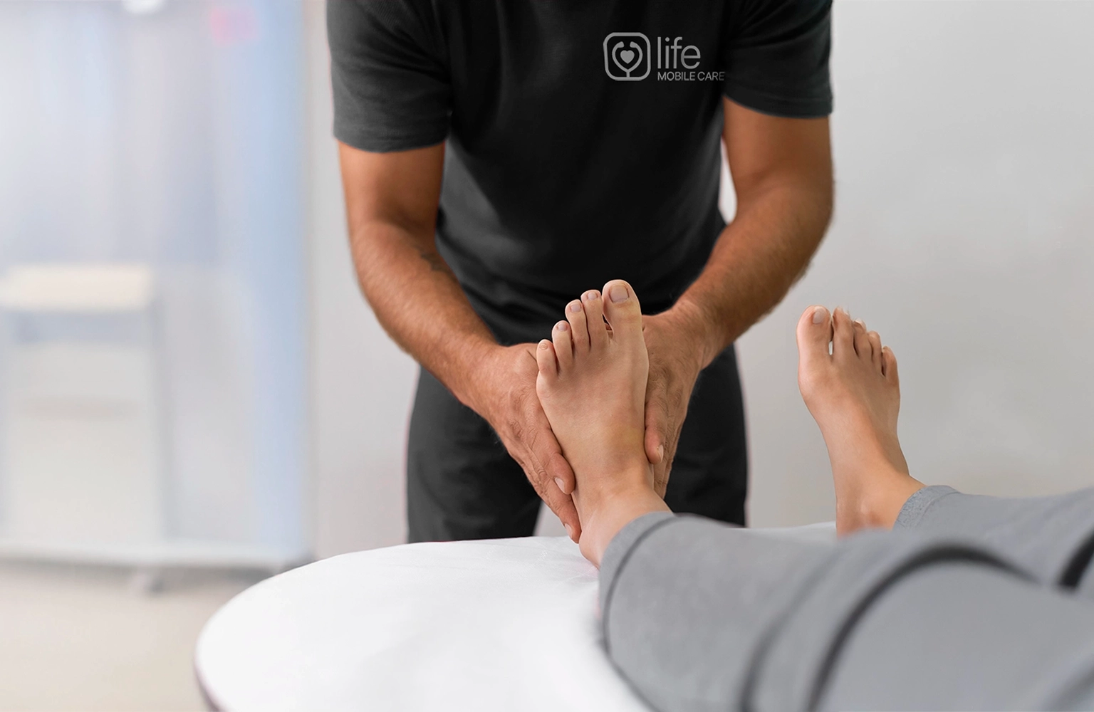 Podiatrist performing foot massage