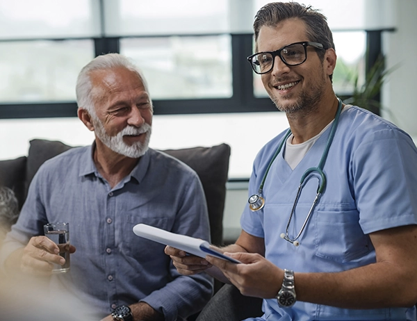 Clinical care coordinator explaining discharge steps